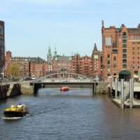 View on Hamburg Hafencity, Elbarkade: canal, bridge, Speicherstadt