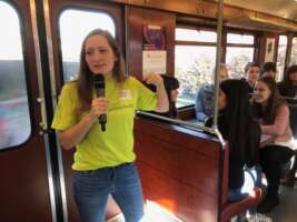 Young science professor Alexandra Göbel hacking subway teaching pupils