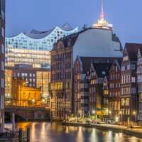 Hamburg Hafencity at night, canal, terasses, concerthall for corporate events