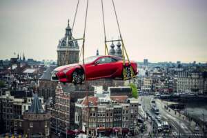 Lexus car hanging high above Amsterdam city centre